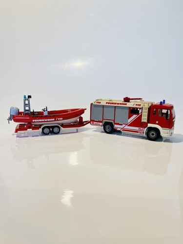 Siku 2102 man - feuerwehr, mit